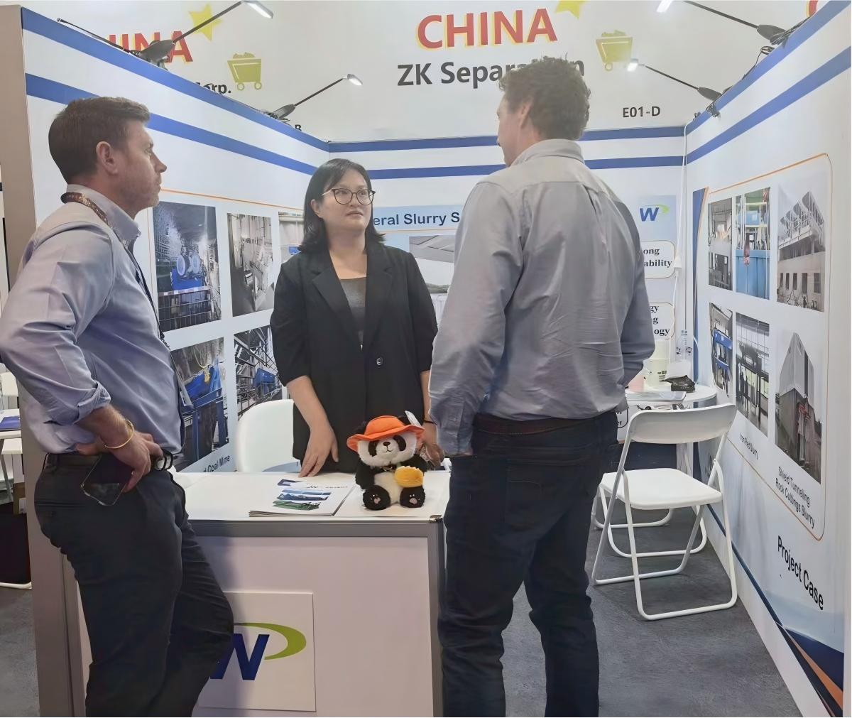 Mining visitors talking with the ZK SEPARATION team at booth E01-D during IMARC 2026